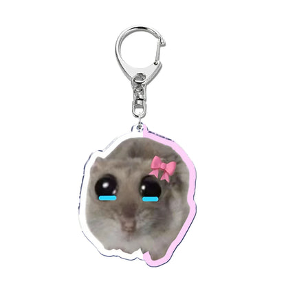 Sad hamster meme keychain