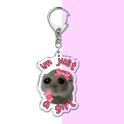 Sad hamster meme keychain